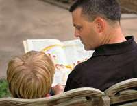 Daddy doing daily reading - behind